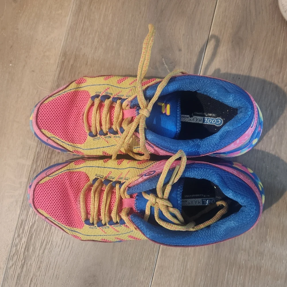 Fila multi color tennis shoe. Pink, yellow, and blue. Great tread. Yellow laces